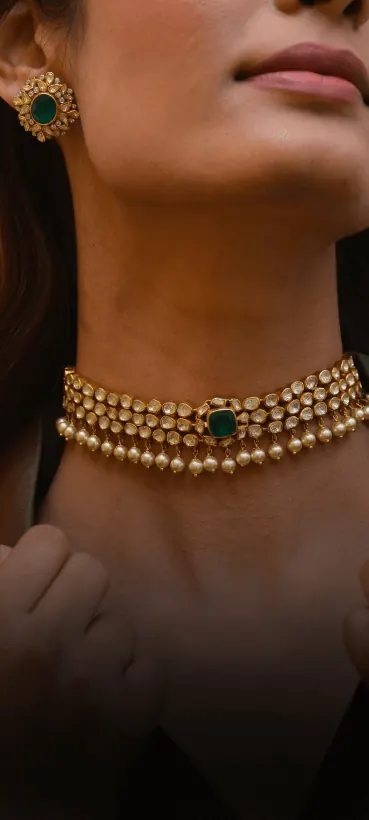 Gold choker necklace close-up
