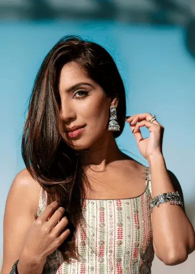 Woman in festive wear with gold jewellery